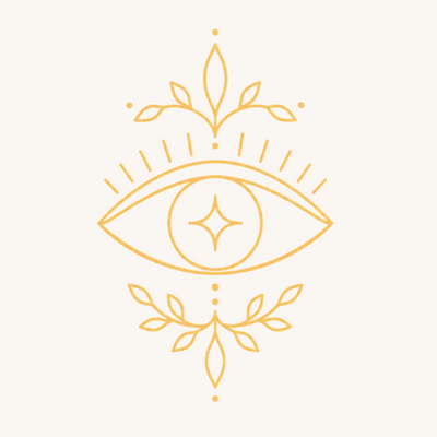 A minimalist gold line art icon of an eye with decorative leafy branches above and below, centered on a solid cream background.