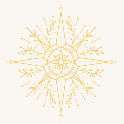 A gold compass rose design with delicate branch-like rays radiating from a central star, centered on a light cream background.