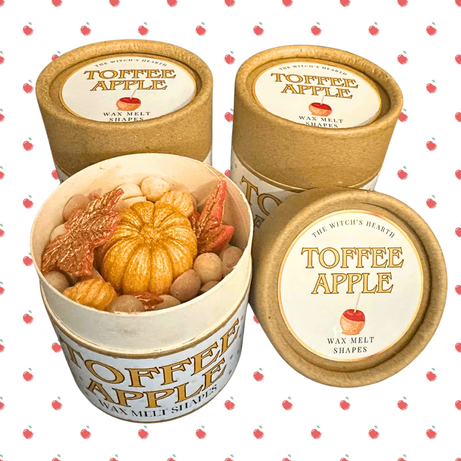 Toffee Apple wax melt containers with pumpkins on a white background